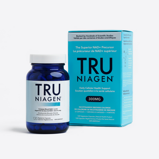 A blue bottle of TRU Niagen supplement with white and light blue label, containing 120 capsules for daily NAD+ support. It also features the blue carton packaging the products comes in.